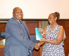Deputy chief justice hon justice Yorokamu Bamwine receives a report on negotiating gender justice from executive director center for Domestic Violence Prevention Tina Musuya ,during the high level forum for judges on justice for women and girls 2018,at Sheraton hotel in Kampala on Thursday 29/2018.Photo by Sylvia Katushabe. Deputy chief justice hon justice Yorokamu Bamwine receives a report on negotiating gender justice from executive director center for Domestic Violence Prevention Tina Musuya ,during the high level forum for judges on justice for women and girls 2018,at Sheraton hotel in Kampala on Thursday 29/2018.Photo by Sylvia Katushabe.